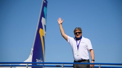 Andrew Levy, chairman and chief executive officer of Avelo Airlines, waves as he boards the inaugural flight. AFP