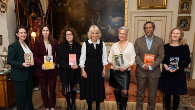 Shortlisted authors pose with their books during a reception with Queen Camilla at Clarence House, in London, on November 12, before the 2024 Booker Prize ceremony. AFP