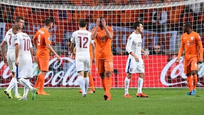 Netherlands striker Robin van Persie reacts during his team's Euro 2016 qualifying elimination on Tuesday in a loss to Czech Republic. Emmanuel Dunand / AFP / October 13, 2015