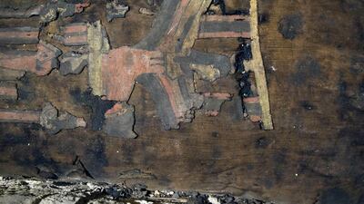 An artifact on display at the recently discovered burial chamber at Tuna el-Gebel, Egypt. AP