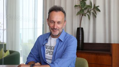 Zoltan Rendes, partner and chief marketing officer at SunMoney Solar Group, says you don't need money to be happy. Pawan Singh / The National