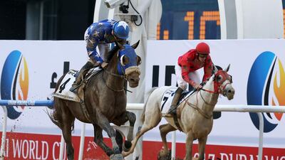 Reda, left, ridden by Harry Bentley rides to victory in the Dubai Kahayla Classic. Pawan Singh / The National