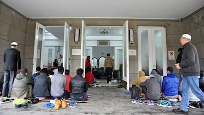 Muslims praying during Friday prayers at a mosque in Taipei. Mandy Cheng / AFP