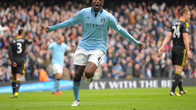 Yaya Toure, of Ivory Coast, will continue to drive Manchester City's midfield. Andrew Yates / AFP