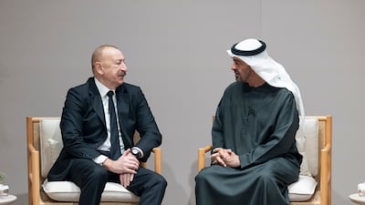 President Sheikh Mohamed, right, with Ilham Aliyev, President of Azerbaijan, at the Abu Dhabi National Exhibition Centre. UAE Presidential Court