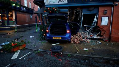 General view of a car that has crashed through the front window of an Italian restaurant in Hale in Manchester, Britain. Reuters