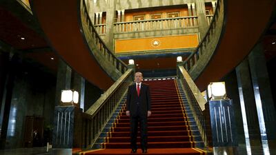 File photo of Turkey's president Recep Tayyip Erdogan at the new presidential palace in Ankara, Turkey. Irritated by accusations of over-indulgent extravagance, Mr Erdogan has vowed to resign if the leader of the main opposition can find a single golden toilet seat in his vast new palace as alleged. Umit Bektas/Reuters