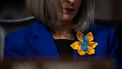 Joni Ernst, a Republican senator from Iowa, wears a brooch in the colours of Ukraine during a Senate Armed Services Committee hearing at the US Capitol. EPA