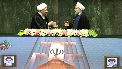 Hassan Rouhani, right, with judiciary chief Sadegh Larijani during his swearing in for a second term as president on August 5, 2017. Nazanin Tabatabaee Yazdi / Tima via Reuters