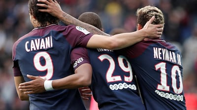 Edinson Cavani, left, and Neymar, right, show that all is well between them. Benoit Tessier / Reuters
