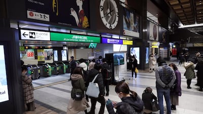 People gather at Sendai station after a strong earthquake hit northeastern Japan, in Sendai, northeastern Japan, late 13 February 2021. EPA