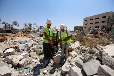 The Heritage Guardians work in the absence of equipment and resources in Gaza. Photo: Mohammed Abu Doon