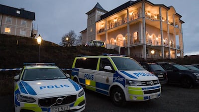 Police vehicles are seen near the premises of the Johannesberg Castle in Rimbo, some 50 km north of Stockholm, Sweden. EPA