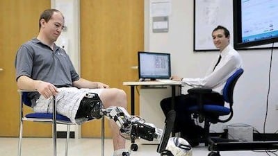 Zac Vawter, left, climbed 103 flights of stairs to the top of the Willis Tower in Chicago. Brian Kersey / AP Photo