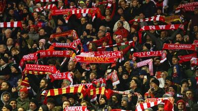 The Anfield stadium is like a box inside, with fans close, and hearing You’ll Never Walk Alone and seeing all the supporters waving their scarves and flags on the Kop is incredible, according to Diego Forlan. Alex Livesey / Getty Images