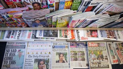 epa09063786 A newspaper stand in London, Britain, 09 March 2021. US channel CBS aired a television interview with Britain's Harry and Meghan, Duke and Duchess of Sussex on 07 March. Buckingham Palace is yet to respond to racism allegations following the TV interview that was broadcast in the UK on 08 March. EPA/FACUNDO ARRIZABALAGA
