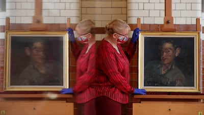 A painting of Stephen Hawking is displayed at the Science Museum. Reuters