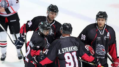 Vitali Savko of the Storm, right, celebrates scoring. Chris Whiteoak / The National