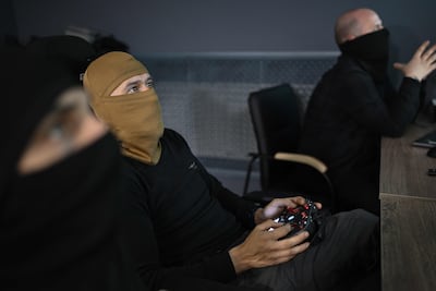 A Ukrainian drone operator in an underground control room. AFP