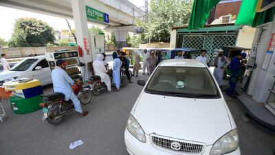 Queues at a fuel station in Peshawar. Pakistan has experienced lengthy power cuts over the past month. EPA