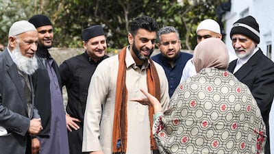 Aihtsham Rashid, centre, and members of the Muslim community attend the opening of the first mosque built on the Western Isles, Stornoway, Scotland, on May 11, 2018. Jeff J Mitchell / Getty Images