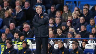 Manchester United manager David Moyes watches from the touchline as his team dropped their seventh league game on Sunday night. Eddie Keogh / Reuters
