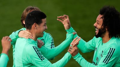 Ream Madrid's James Rodriguez and Marcelo enjoy the session. AP