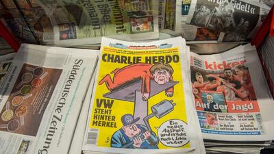 The German edition of Charlie Hebdo on sale at a bookstore at the main station in Frankfurt am Main, Germany, 1 December 2016. The first German-language edition of the French satirical magazine Charlie Hebdo is on sale in Germany. Andreas Arnold / EPA