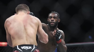 Aljamain Sterling punches Petr Yan. AFP