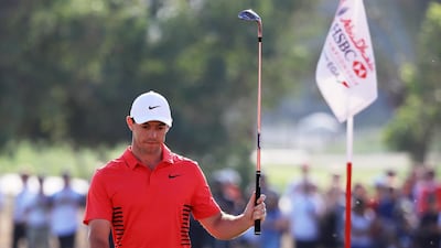 Rory McIlroy of Northern Ireland celebrates after chipping in for birdie on the 17th hole during round three of the Abu Dhabi HSBC Championship at Abu Dhabi Golf Club. Matthew Lewis / Getty Images