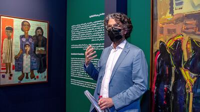 Carlo Rizzo, special adviser to the Dubai Collection, gives a tour at the Etihad Museum. Victor Besa / The National