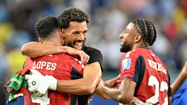 Cape Verde's goalkeeper Vozinha celebrates with teammates after the 2-2 draw with Uruguay. AFP