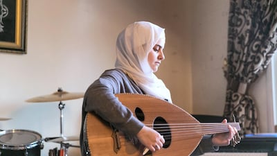 Syrian singer-songwriter Ghaliaa Chaker in her home in Al Ain. Photo by Reem Mohammed/The National
