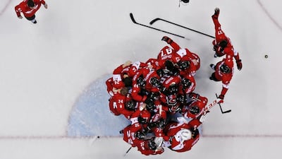 Players of Canada celebrate after the Men’s Gold Medal match between Sweden and Canada at the Bolshoy Ice Dome in the Men’s Ice Hockey tournament at the Sochi 2014 Olympic Games, Sochi, Russia, on February 23, 2014. Canada won 3-0. EPA/LARRY W. SMITH