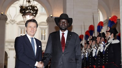 South Sudan President Salva Kiir and Italian Premier Giuseppe Conte shake hands during a welcome ceremony ahead of a Vatican retreat. AP