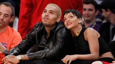 Rihanna, right, with Chris Brown, who she says is "the one". Danny Moloshok / Reuters