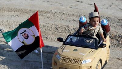 Nine-month-old Sultan Hazza Al Muharbi was the youngest driver at the Du Forum on Thursday. Delores Johnson / The National