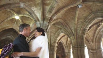 Dubai residents Krysia and Stuart McKechnie on their wedding day in November 2013 at Glasgow's University Chapel. The couple paid for the majority of the event themselves using their savings. Courtesy Krysia and Stuart McKechnie