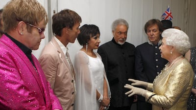 From left, Sir Elton John, Sir Cliff Richard, Dame Shirley Bassey, Sir Tom Jones and Sir Paul McCartney meet the monarch after a diamond jubilee event. Getty