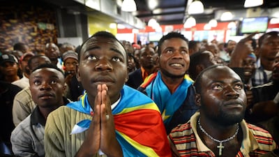 Congo supporters Lubina Shakespeare and Avsene Banza, watch their side's match against Ghana in hope. Photo: Bram Lammers