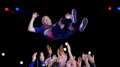 Barcelona's Andres Iniesta is thrown in the air by teammates during a tribute after the Spanish league football match between Barcelona and Real Sociedad at the Camp Nou stadium in Barcelona. Iniesta, who joined Barcelona's academy 22 years ago, played his final game for the club. Lluis Gene / AFP