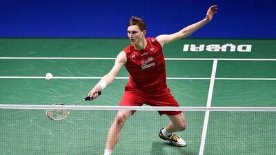 Viktor Axelsen of Denmark plays a shot against Lee Chong Wei of Malaysia during their match. Stringer / AFP