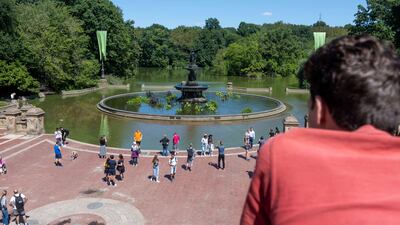 People visit the flooded Bethesda Fountain in Central Park after a night of extremely heavy rain caused by Hurricane Ida on September 2, 2021, in New York City. AFP
