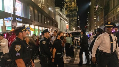 A New York Police Department officer leads away an arrested protester outside Grand Central Terminal during a rally calling for a ceasefire between Israel and Hamas. AP Photo