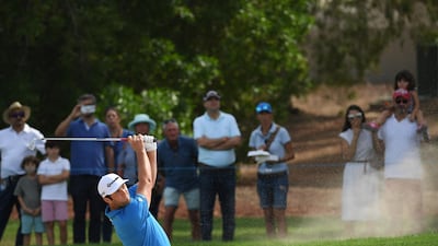 DUBAI, UNITED ARAB EMIRATES - NOVEMBER 16: Jon Rahm of Spain plays his second shot from a bunker on the 1st hole during day two of the DP World Tour Championship at Jumeirah Golf Estates on November 16, 2018 in Dubai, United Arab Emirates. (Photo by Ross Kinnaird/Getty Images)