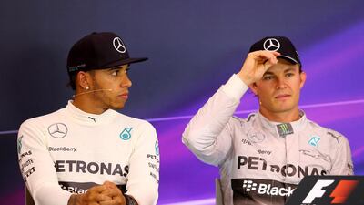 Lewis Hamilton, left, and Nico Rosberg have been reminded of the team’s policies. Mathias Kniepeiss / Getty Images