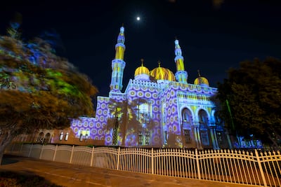 The Jumeirah Grand Mosque in Dubai being lit up during Ramadan. Leslie Pableo for The National