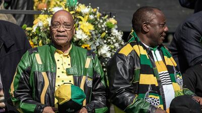 A 2016 file photo of Jacob Zuma (L) and Cyril Ramaphosa arriving at an ANC rally in Johannesburg. AFP