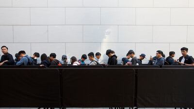Customers line up for the new iPhone X outside an Apple store in Hong Kong, China. Alex Hofford / EPA