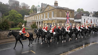 The Household Cavalry's Life Guards ride through Windsor. AFP